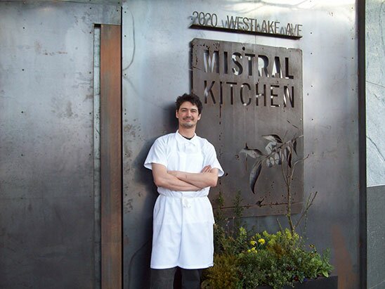 Chef Belickis at the front door of Mistral